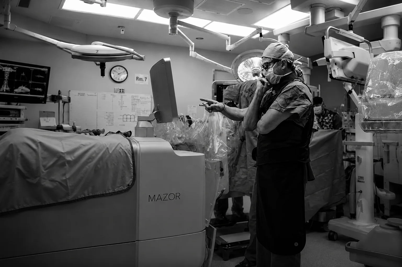 Dr. Rod J. Oskouian in the operating room with the Mazor robotic spine surgery system